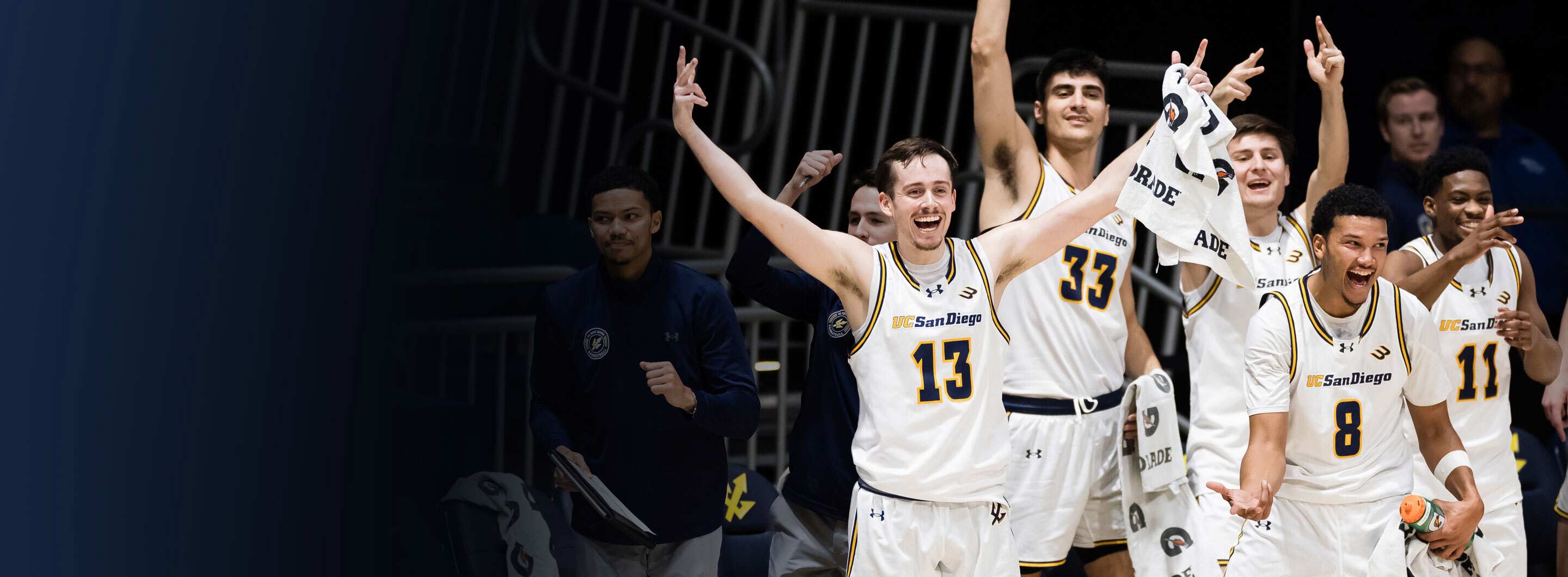 Men's basketball team cheering