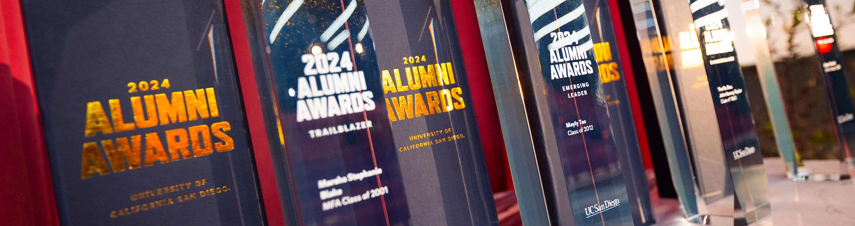 Alumni Awards lined up on stage