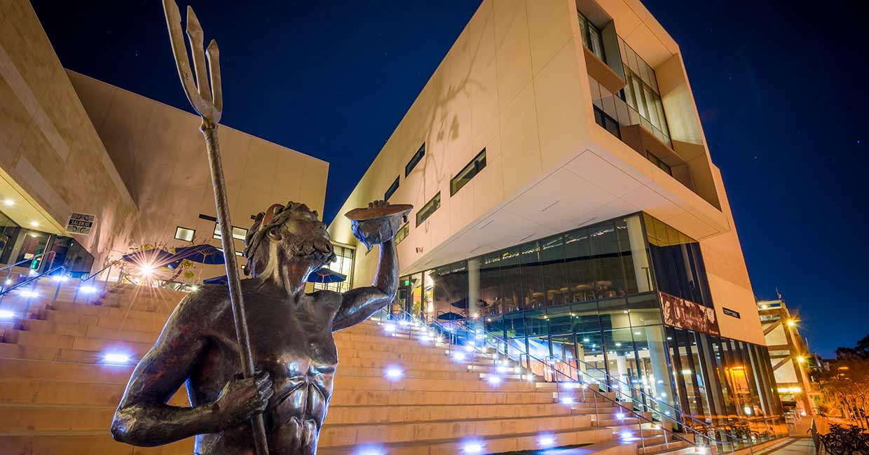 King Triton statue at night time